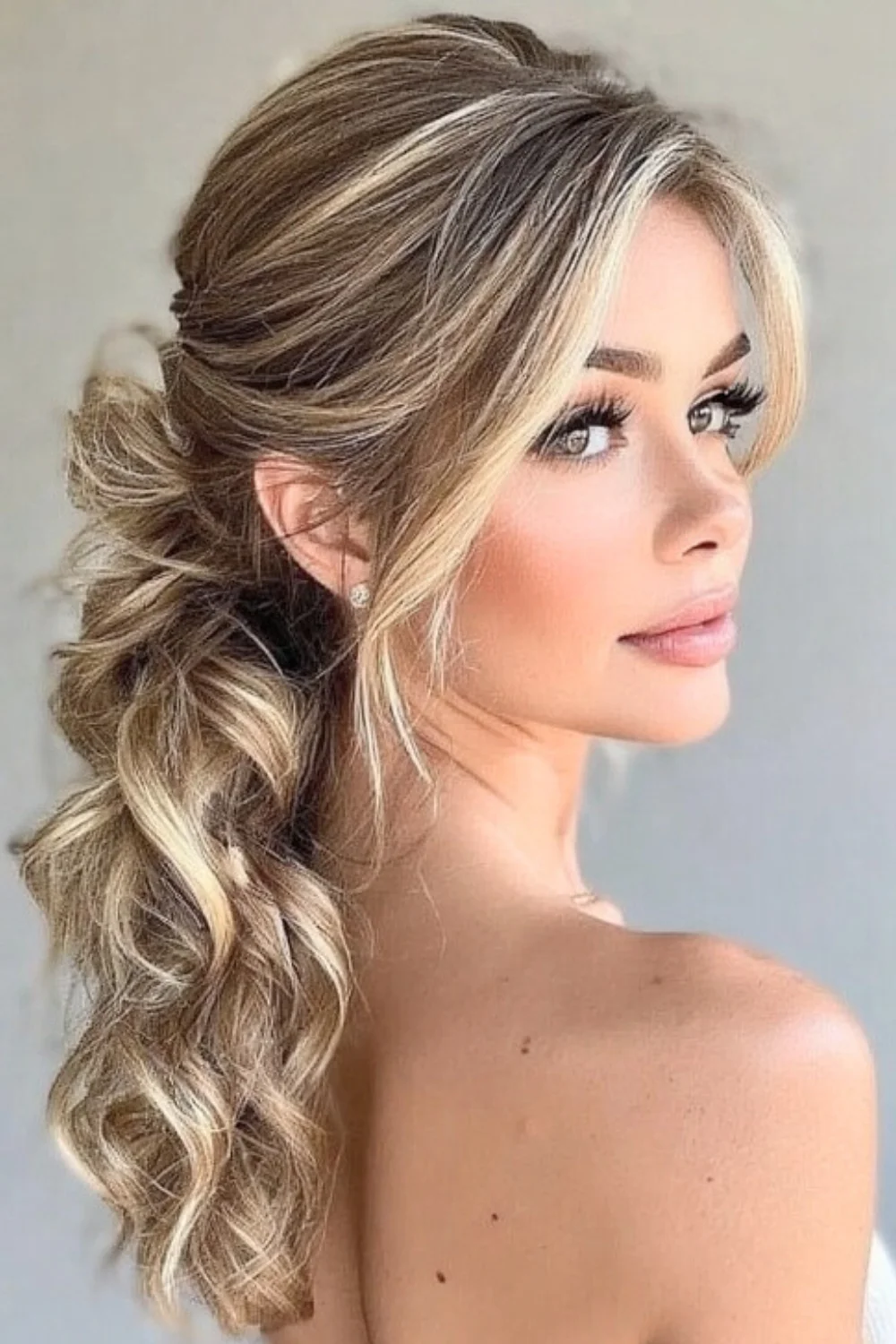 Textured Ponytail With Wrapped Base