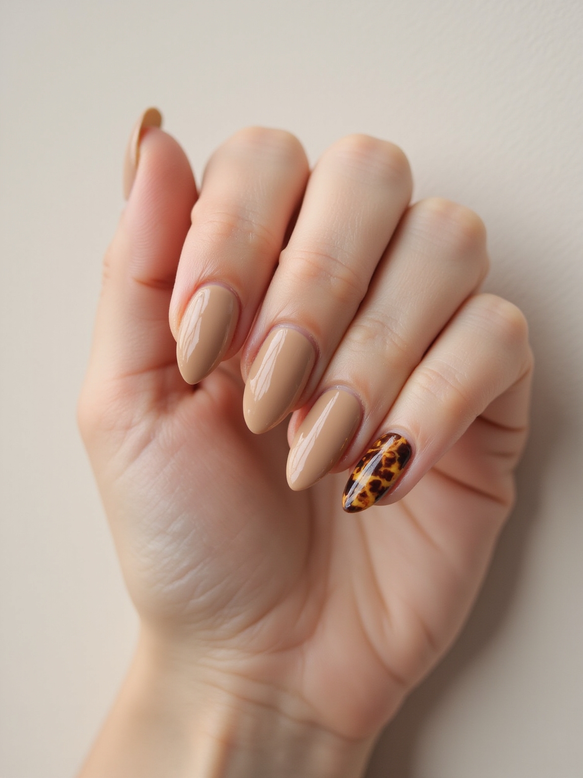 subtle caramel tortoiseshell nail accents