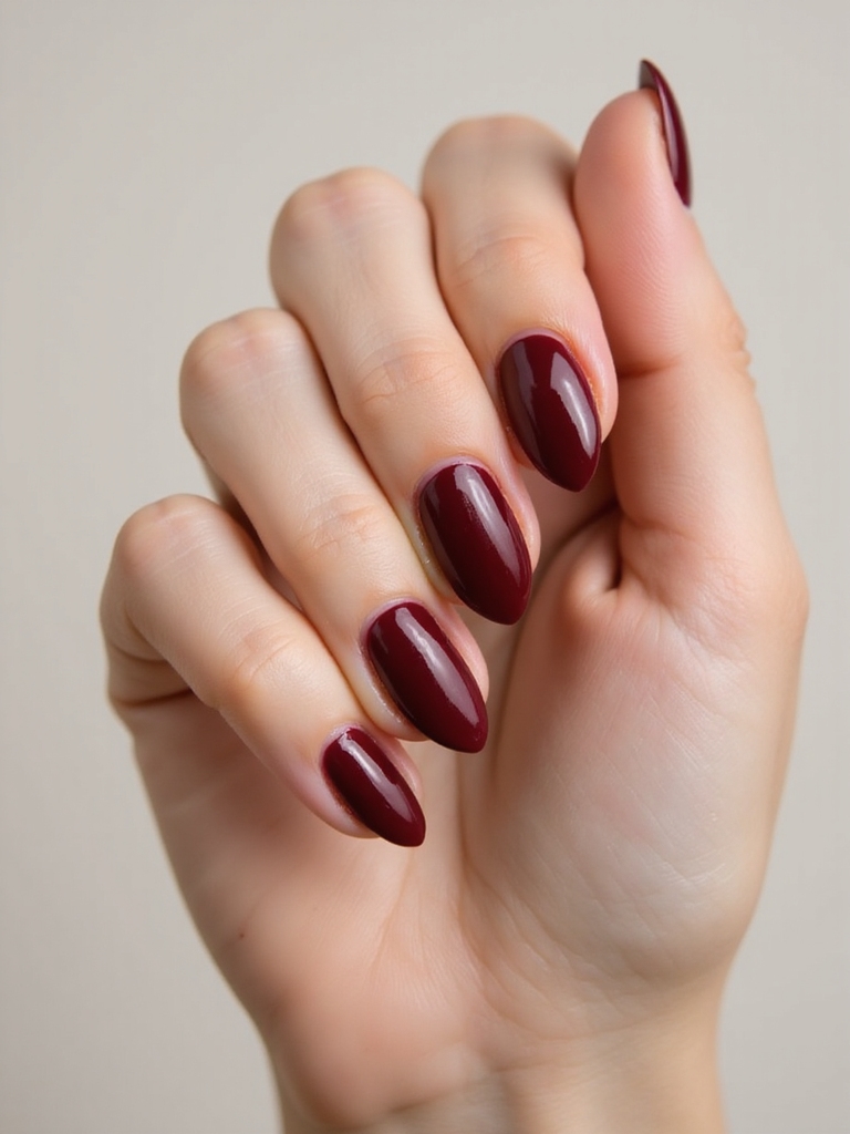 velvety oxblood almond nails